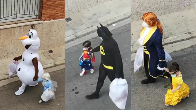 Na Espanha, pai e filha usam fantasias para levar o lixo durante o período de quarentena